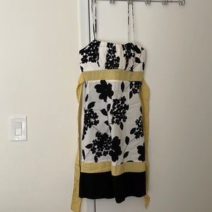 Black and white floral dress with yellow tie details, size 9